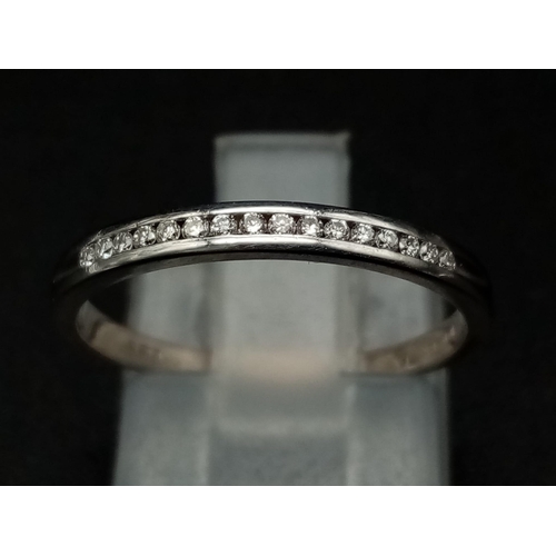 1545 - 18k white gold channel set diamond half eternity ring 1.8g Size M (dia:0.15ct)