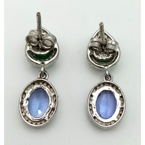 1501 - 925 Sterling Silver, Diamond, Emerald and Tanzanite Earrings. Total Weight 3.90grams. 1.35cts Emeral... 