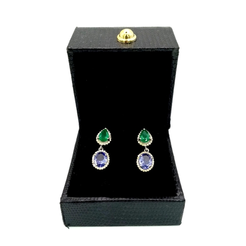 1501 - 925 Sterling Silver, Diamond, Emerald and Tanzanite Earrings. Total Weight 3.90grams. 1.35cts Emeral... 