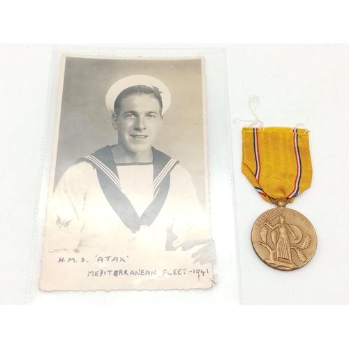 1510 - A WW2 American Defence Medal June 1941 Along with the same Date Postcard with Inscription HMS Ajax w... 