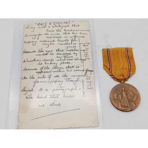 1510 - A WW2 American Defence Medal June 1941 Along with the same Date Postcard with Inscription HMS Ajax w... 