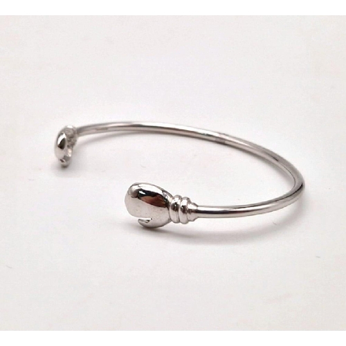 9k White Gold Boxing Glove Baby Bangle. Weighs 6.3g