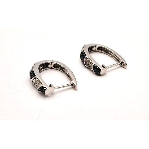 1558 - 9k White Gold Black and White Diamond Hinged Hoop Earrings. Total Weight 5grams