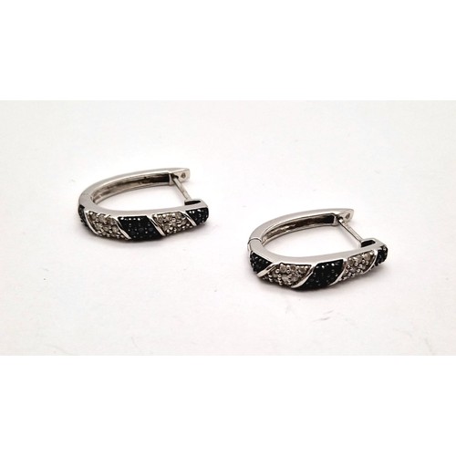 1558 - 9k White Gold Black and White Diamond Hinged Hoop Earrings. Total Weight 5grams