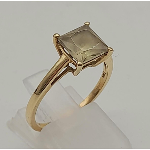 1570 - 14K Yellow Gold Dress Ring with a nice khaki Square Stone 2.7grams Size Q.