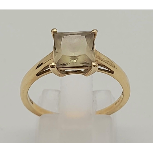 1570 - 14K Yellow Gold Dress Ring with a nice khaki Square Stone 2.7grams Size Q.