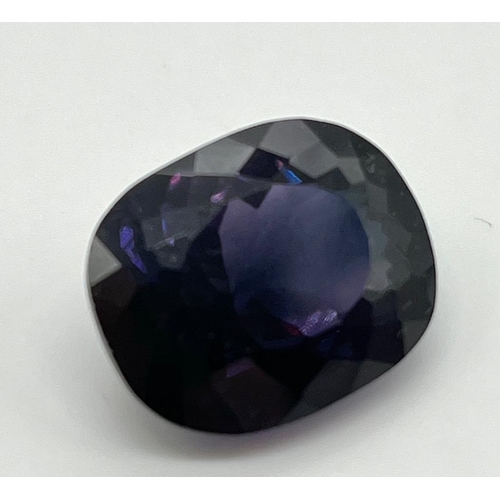 781 - A 23ct Purple-Coloured Oval Shape Gemstone. 20 x 18mm. No certificate so as found