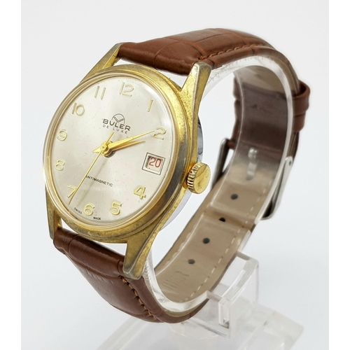 1003 - A Vintage Buler Deluxe Mechanical Gents Watch. Brown leathet strap. Two tone case - 34mm. Silver ton... 