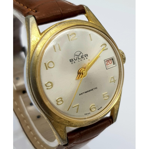 1003 - A Vintage Buler Deluxe Mechanical Gents Watch. Brown leathet strap. Two tone case - 34mm. Silver ton... 