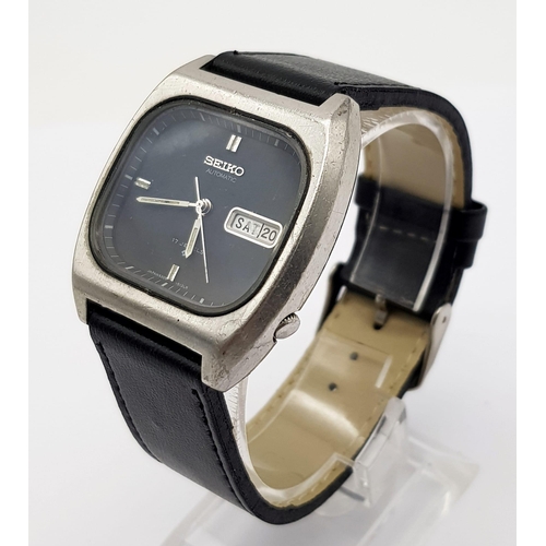 1024 - A Vintage Seiko Automatic Gents Watch. Black leather strap. Stainless steel case - 36mm. Black dial ... 