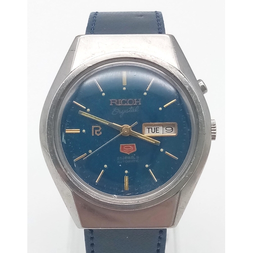 1230 - A Vintage 21 Jewel Ricoh Crystal 9 Gents Watch. Blue leather strap and stainless steel case - 37mm. ... 