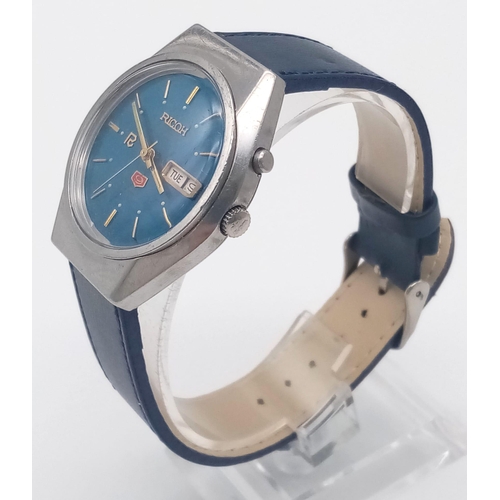 1230 - A Vintage 21 Jewel Ricoh Crystal 9 Gents Watch. Blue leather strap and stainless steel case - 37mm. ... 