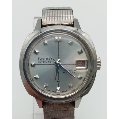 1242 - A Seiko 21 Jewel Hi-Beat Automatic Ladies Watch. Stainless steel strap and case - 23mm. Silver tone ... 