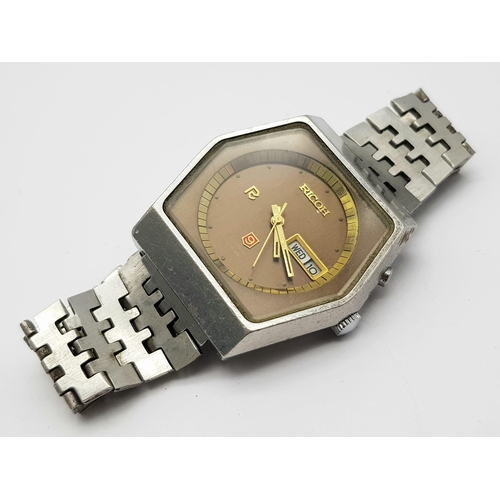 1402 - A Vintage Ricoh 21 Jewel Automatic Gents Watch. Stainless steel strap and Hexagonal case - 37mm. Bro... 