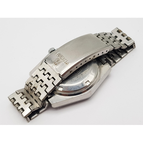 1402 - A Vintage Ricoh 21 Jewel Automatic Gents Watch. Stainless steel strap and Hexagonal case - 37mm. Bro... 