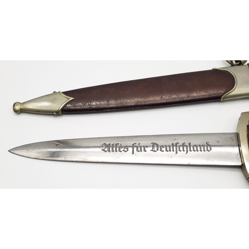 163 - A Circa 1933 German NSKK Enlisted Mans S.A Dagger with Scabbard. Ground Rohm Blade. Gau marked B.O f... 