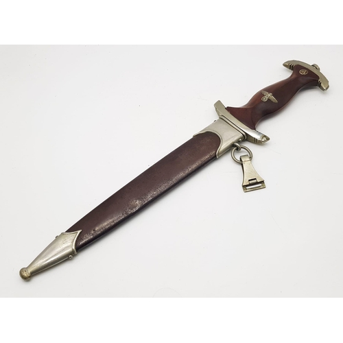 163 - A Circa 1933 German NSKK Enlisted Mans S.A Dagger with Scabbard. Ground Rohm Blade. Gau marked B.O f... 