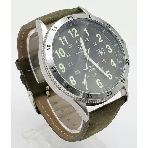 247 - A Tavistock and Jones Quartz Gents Watch. Green leather strap. Stainless steel case - 47mm. Black di... 