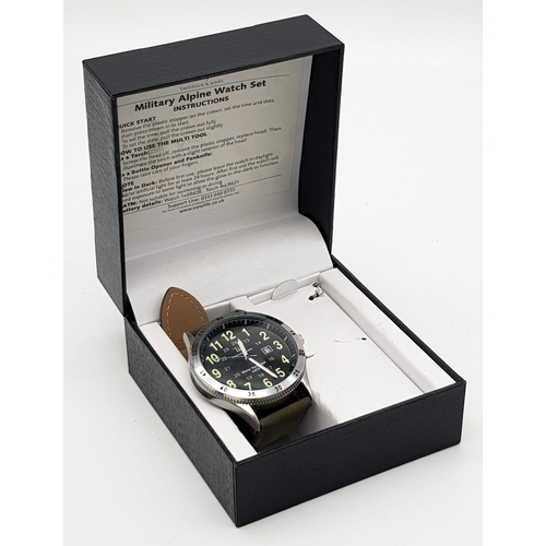 247 - A Tavistock and Jones Quartz Gents Watch. Green leather strap. Stainless steel case - 47mm. Black di... 