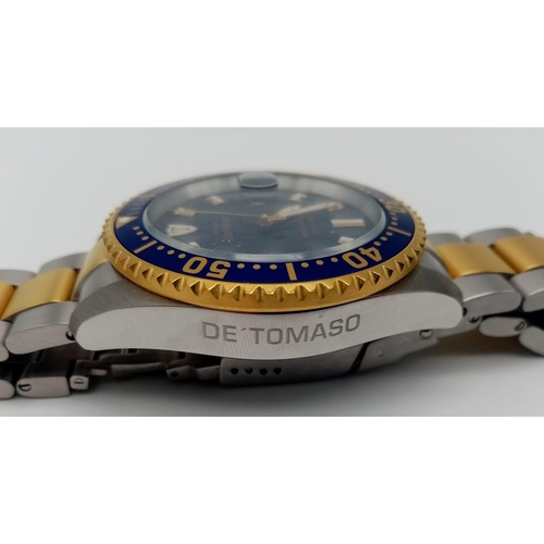 261 - A Detomaso San Remo Professional Automatic Gents Watch.
Two tone strap and case - 43mm. Blue dial wi... 