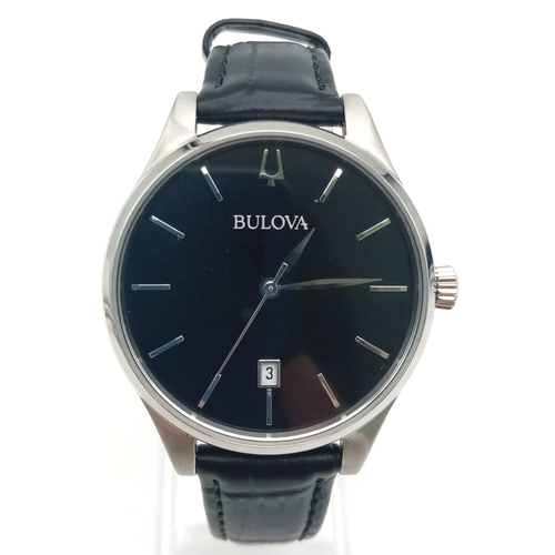 82 - A Bulova Quartz Gents Watch. Black leather strap. Stainless steel case - 36mm. Black dial with date ... 