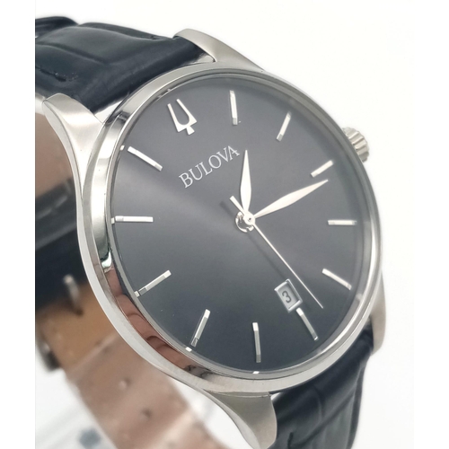 82 - A Bulova Quartz Gents Watch. Black leather strap. Stainless steel case - 36mm. Black dial with date ... 