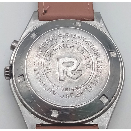 89 - A Vintage Ricoh 21 Jewel Automatic Gents Watch. Pink leather strap. Stainless steel case - 36cm. Pin... 