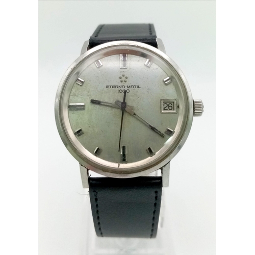 1406 - A Vintage Eterna-Matic 1000 Gents Watch. Black leather strap. Stainless steel case - 35mm. Silver to... 