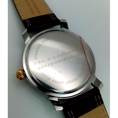 169 - A Geo Chatterton Gents Watch. Brown leather strap (broken). Two tone case - 45mm. Three tone dial wi... 