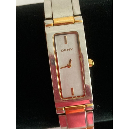 364 - Ladies Quartz wristwatch Face Showing DKNY. Detail on back showing NY3169. Full working order. Some ... 