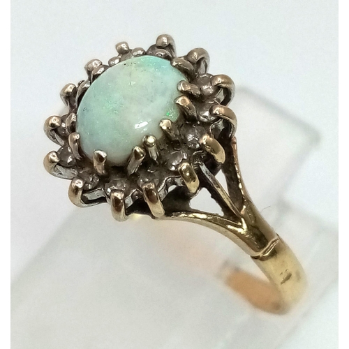 473 - 9K YELLOW GOLD DIAMOND & OPAL CLUSTER RING. TOTAL WEIGHT 1.8G.  SIZE L