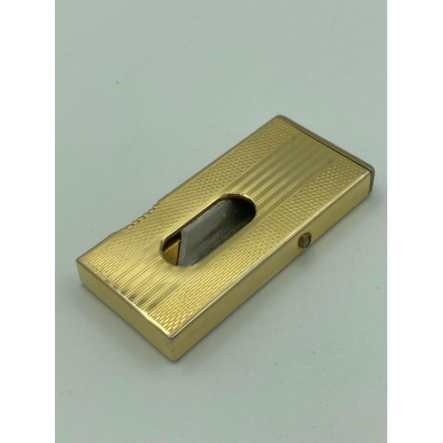 483 - Vintage Gentlemans CIGAR CUTTER with  engine turned designed and gilded finish. Spring action in ful... 