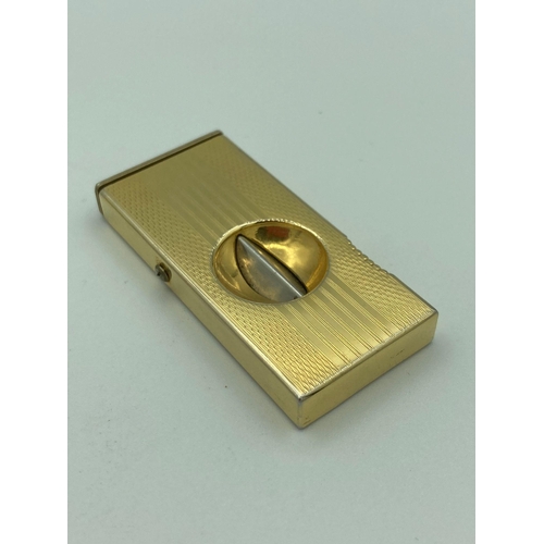 483 - Vintage Gentlemans CIGAR CUTTER with  engine turned designed and gilded finish. Spring action in ful... 