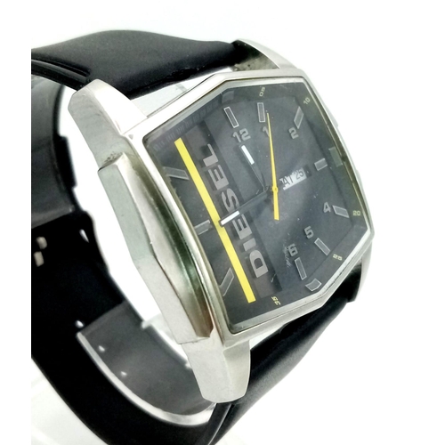 982 - A Diesel Hexagonal Cased Quarts Gents Watch. Black leather strap. Case - 47mm. Black dial with Diese... 