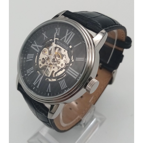 996 - A Montine Skeleton Gents Watch. Black leather strap. Case - 42mm. Automatic movement in working orde... 