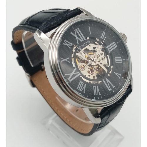 996 - A Montine Skeleton Gents Watch. Black leather strap. Case - 42mm. Automatic movement in working orde... 