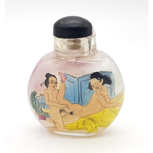 1378 - A 19th century Chinese crystal glass snuff bottle with inside painted erotic pictures to front and b... 