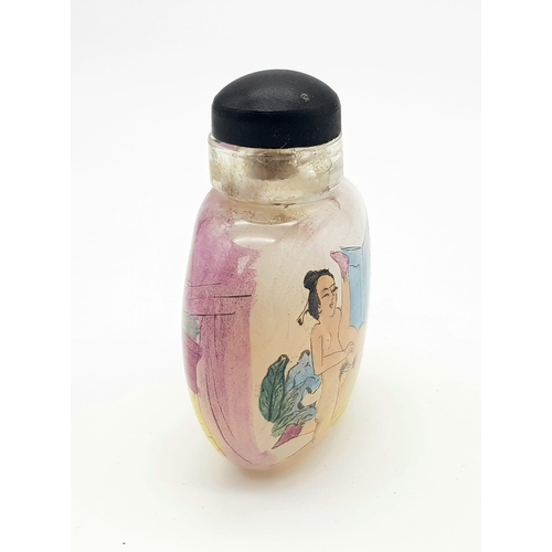 1378 - A 19th century Chinese crystal glass snuff bottle with inside painted erotic pictures to front and b... 