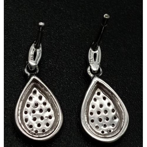 1009 - 9K WHITE GOLD DIAMOND SET DROP EARRINGS. NEED BUTTERFLY BACKS. TOTAL WEIGHT 1.4G