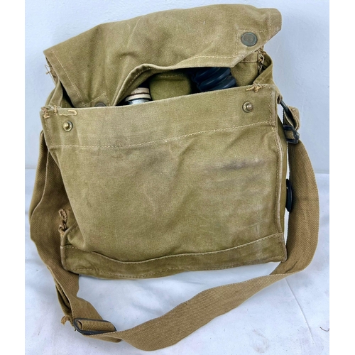 1244 - A Very Good Condition 1944 Dated Military Gas Mask in its Original Khaki Satchel with Anti Dimming T... 