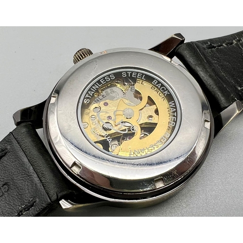 1398 - A Shenhua Skeleton Automatic Gents Watch. Black leather strap. Two tone case - 42mm. Skeleton dial. ... 