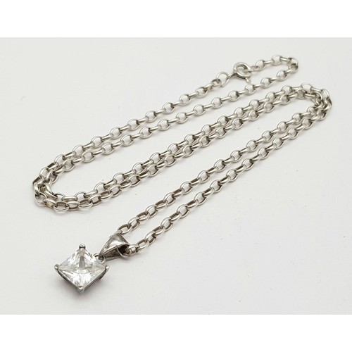 1528 - A Sterling Silver Chain with White Stone Pendant. 44cm and 20mm. 5.59g total weight.