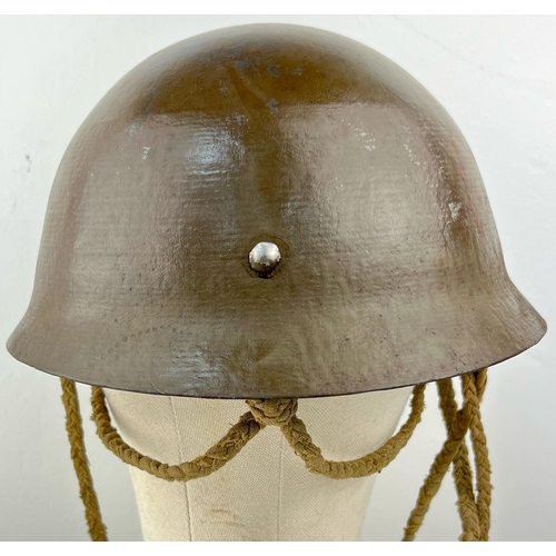 18 - WWII JAPANESE IMPERIAL ARMY HELMET IN MINT CONDITION WITH ORIGINAL TEA-GREEN PAINT, WOVEN HEMP INNER... 