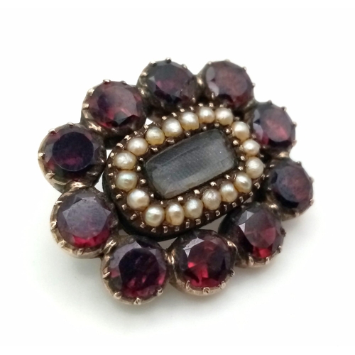 229 - 9K YELLOW GOLD ANTIQUE GARNET , SEED PEARL BROOCH. WEIGHS 7.1G