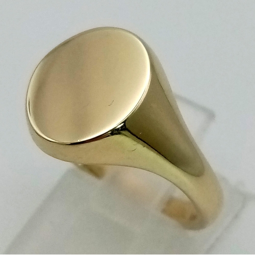 236 - 9K YELLOW GOLD BRAND NEW OVAL SIGNET RING. WEIGHS  7.6G. SIZE P