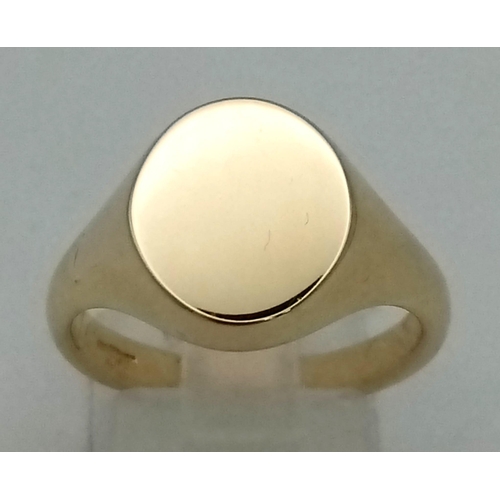 236 - 9K YELLOW GOLD BRAND NEW OVAL SIGNET RING. WEIGHS  7.6G. SIZE P