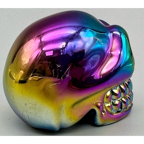 449 - A Titanium Coated Quartz Skull Figure. 6cm.