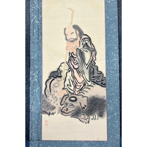 500 - AN 1800'S ORIENTAL BUDDHIST PAINTING ON SILK SCROLL OF AN IMMORTAL.  113 X 43cms (actual painting)