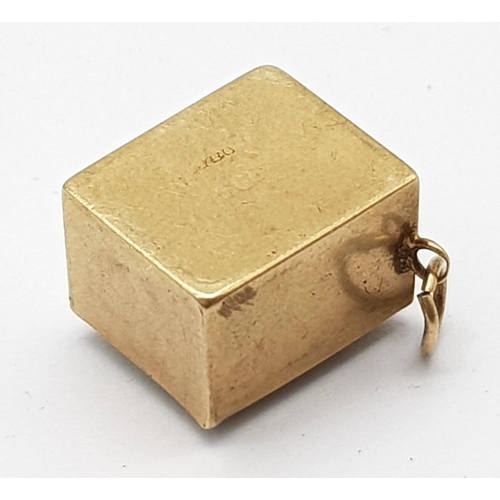 543 - 9K YELLOW GOLD, OLD ONE POUND NOTE CHARM. WEIGHS 3.4G