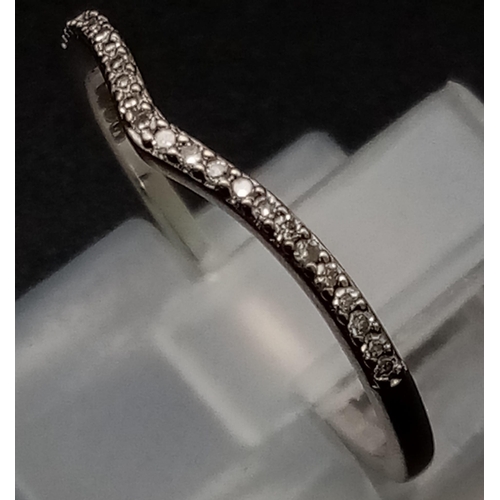 641 - 18K WHITE GOLD DIAMOND SET CURVED BAND RING. WEIGHS 1.3G.  SIZE M